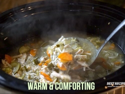 Ladeling out soup from the slow cooker
