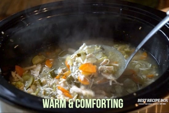 Ladeling out soup from the slow cooker