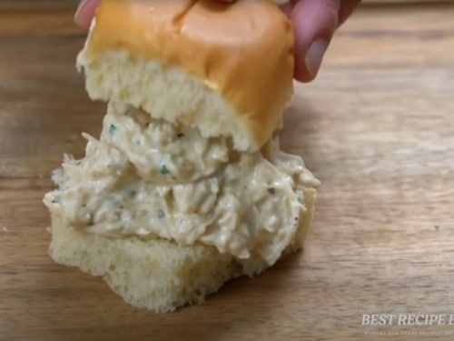 Placing the creamy garlic chicken in a slider