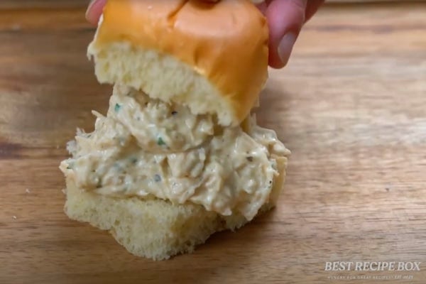 Placing the creamy garlic chicken in a slider