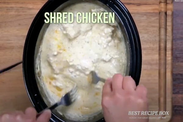 Shredding the slow cooked chicken