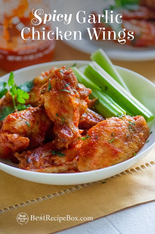 Best Garlic Chicken Wings Recipe loaded with flavor on a plate with celery