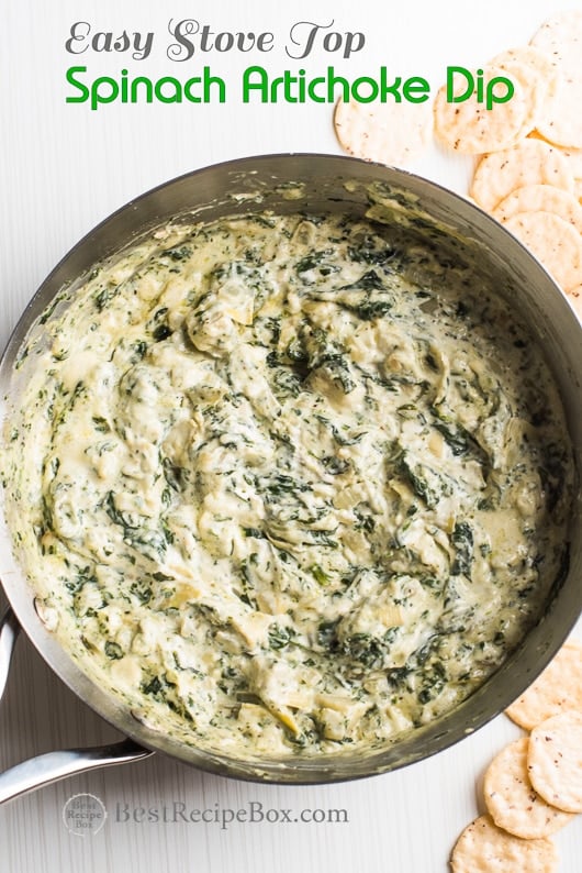 Easy Stove Top Spinach Artichoke Dip Recipe in bowl with crackers 