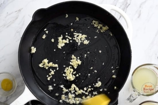 Garlic cooking on a pan