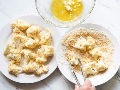 dipping cauliflower in egg then breadcrumbs