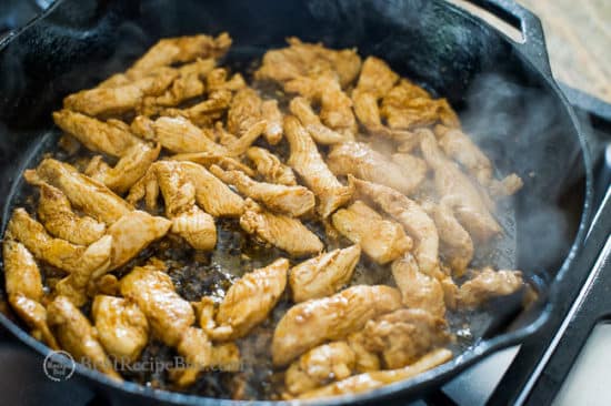 Chicken cooking in pan