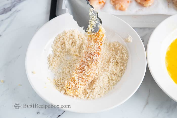 Dredge chicken in mixture for frying