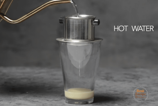 Pouring hot water into coffee filter