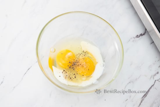 Egg, milk, and seasoning in a bowl