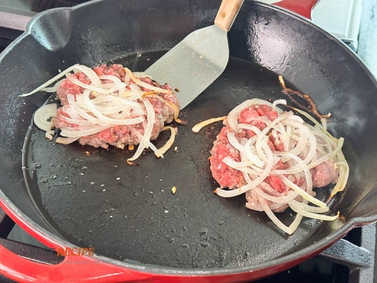 flipping onion burger