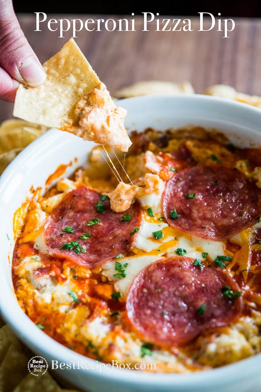 Amazing Pepperoni Pizza Cheese Dip Recipe in a casserole with chips