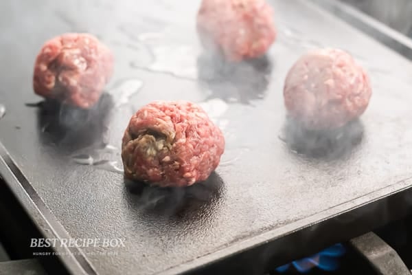 balls of beef on skillet flat top