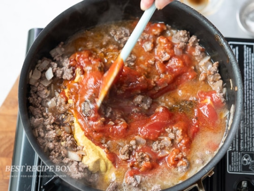 stirring in sauces and spices