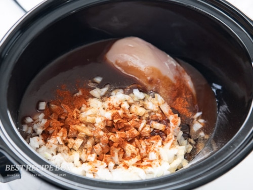 slow cooker bbq chicken ingredients in pot