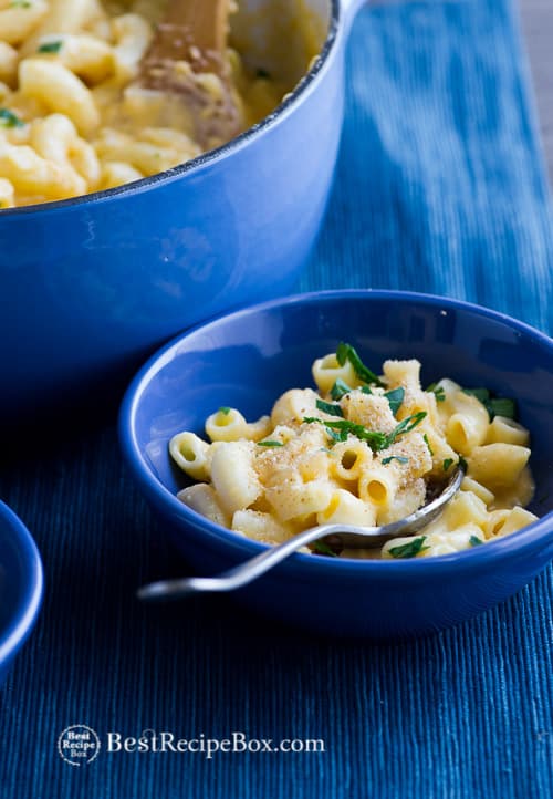 Amazing and easy stovetop creamy mac and cheese recipe in a bowl with spoon