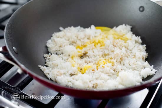 add rice to pan